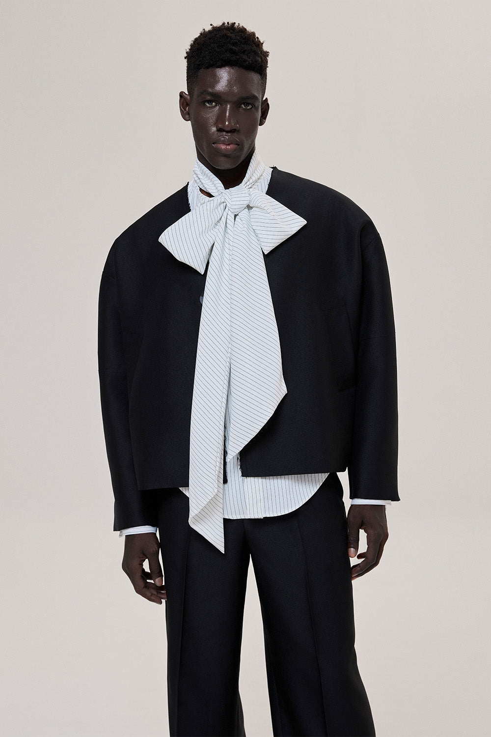 Black Wide Tube Trousers for men, from CAOSTU, The Nam Concept